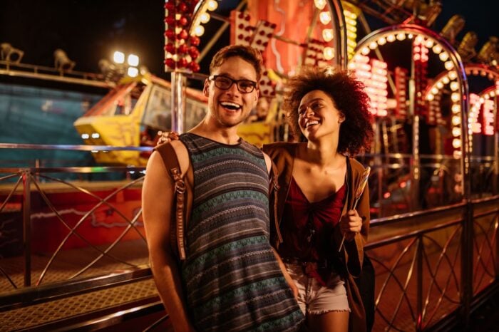 couple having fun in amusement park